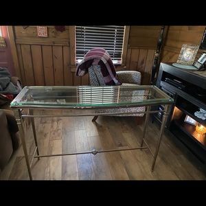 Glasstop table. 5’ Long x 18” wide x 3’ tall